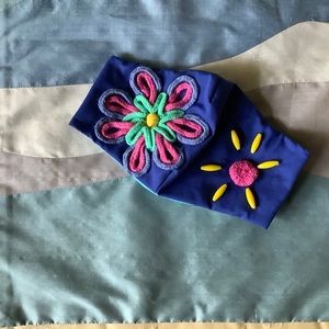 Mask with crochet flowers